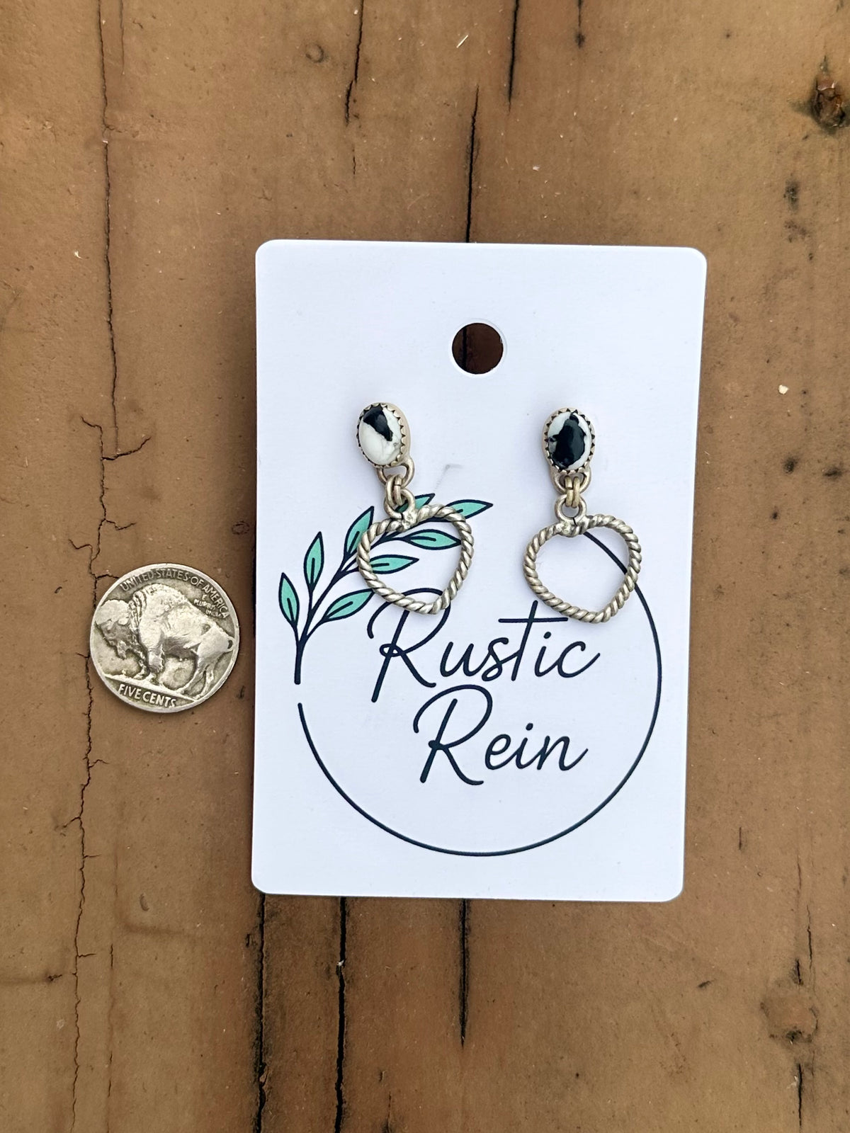 White buffalo heart earrings