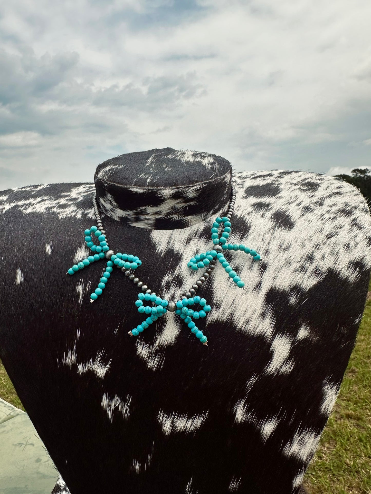 Triple bow necklace