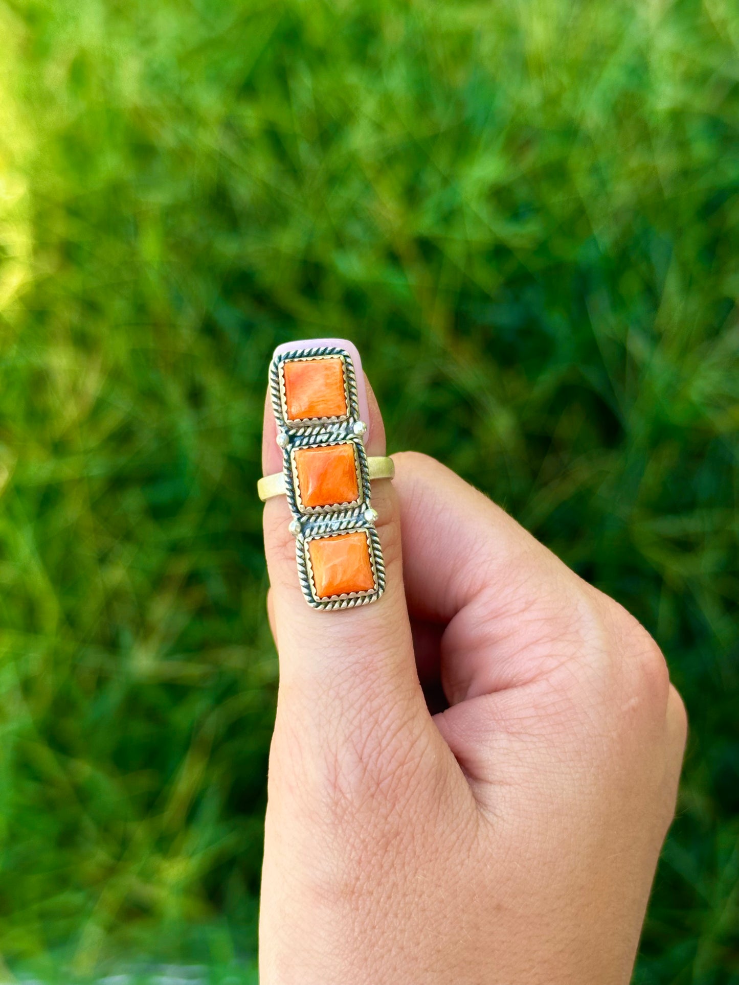 Adjustable orange spiny ring