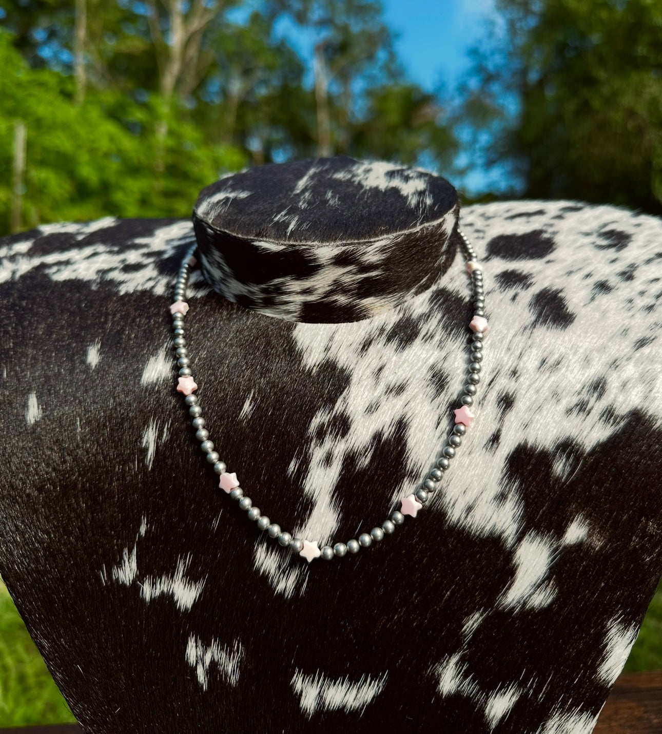 Silver plated pink conch star necklace