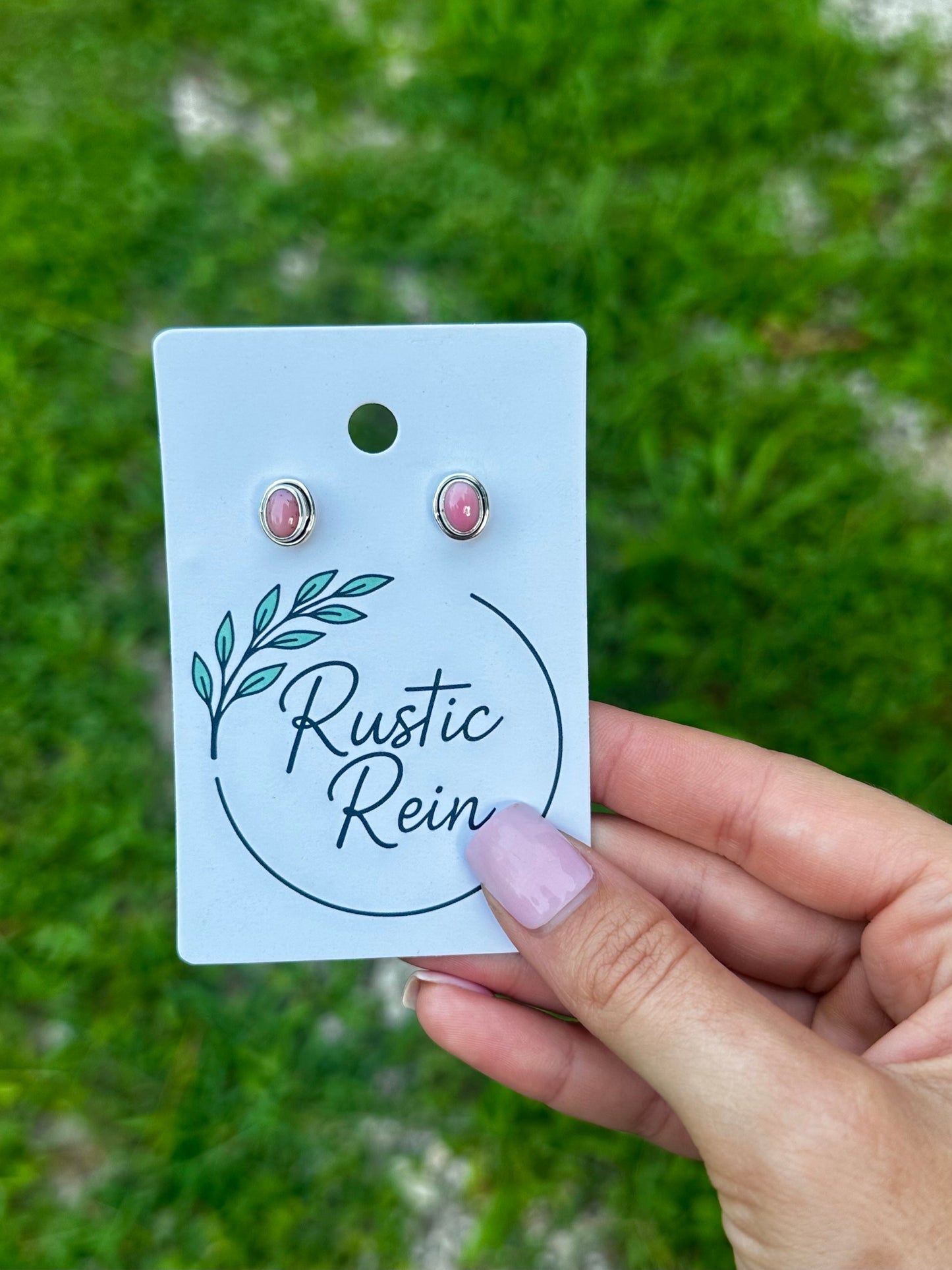 Pink conch stud earrings