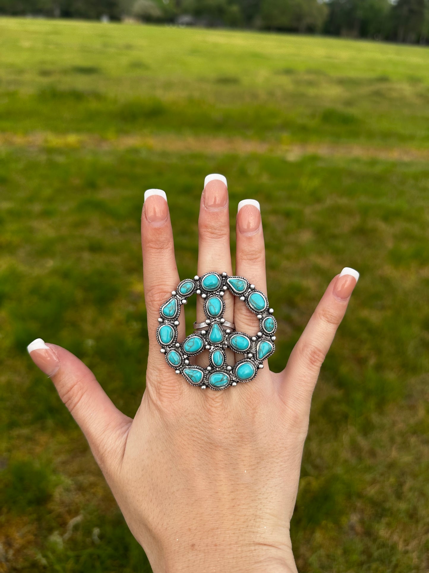 Adjustable peace ring