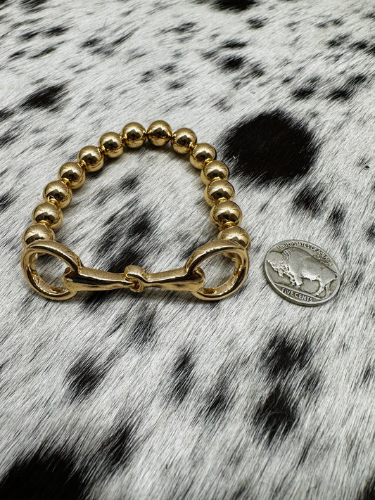 Gold color snaffle stretch bracelet