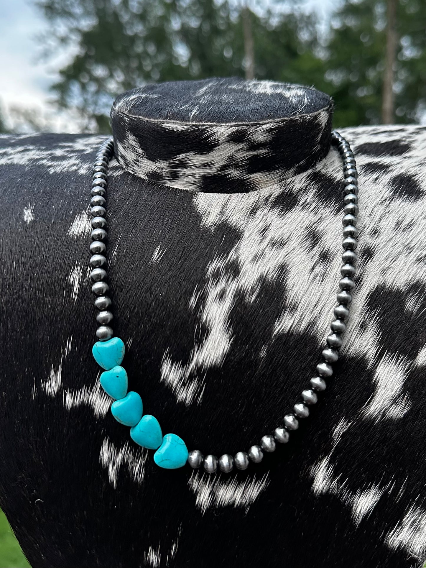 Off center heart necklace