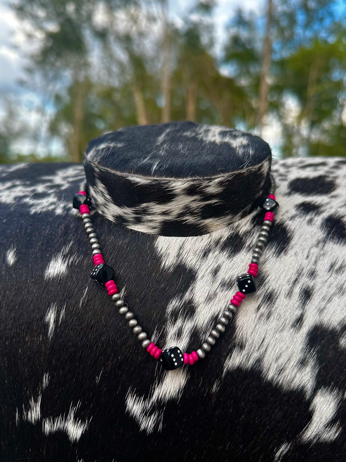Pink dice necklace