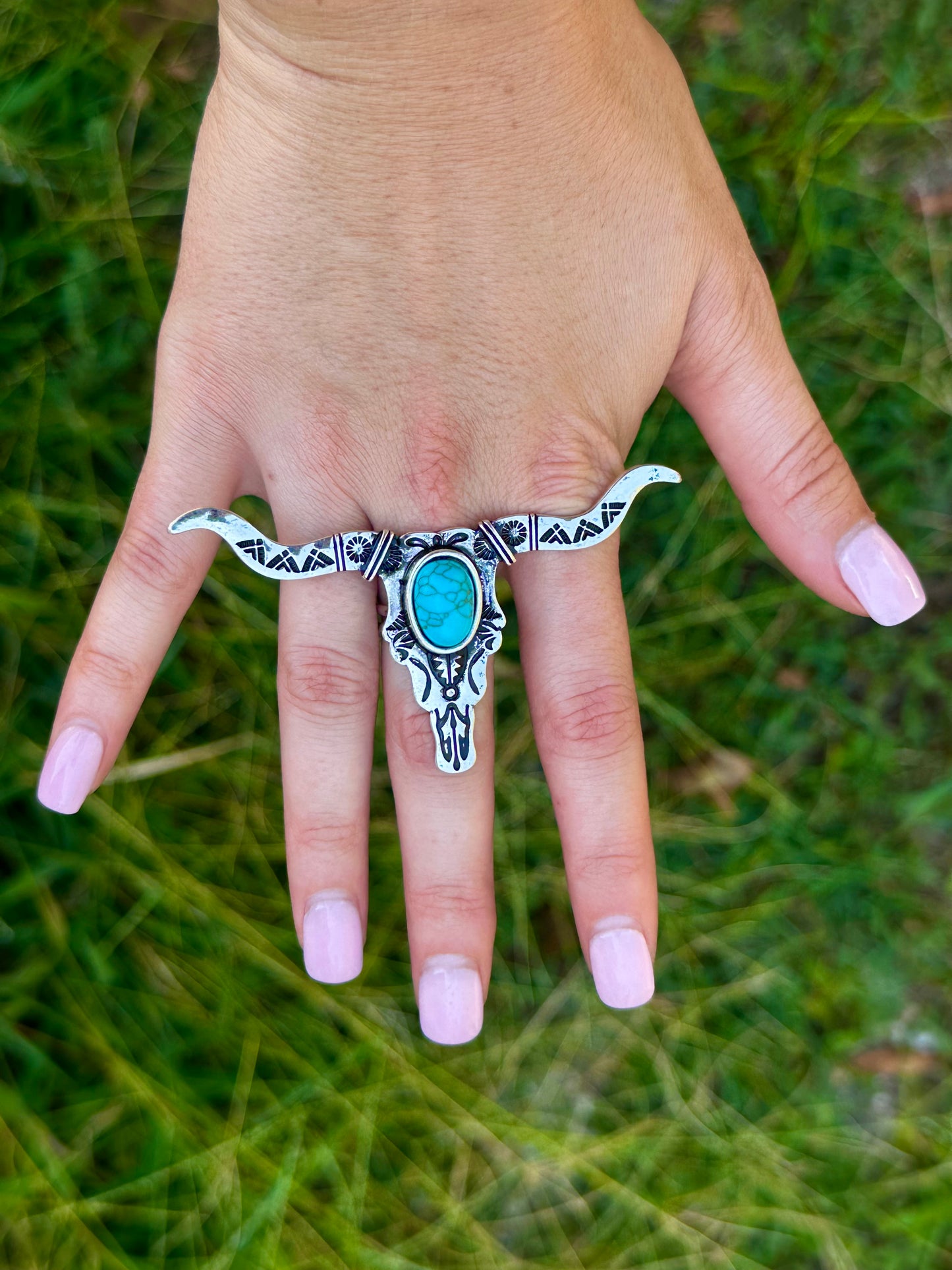 Adjustable longhorn ring