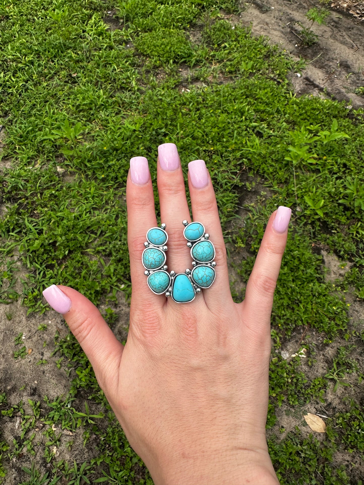 Adjustable horseshoe ring