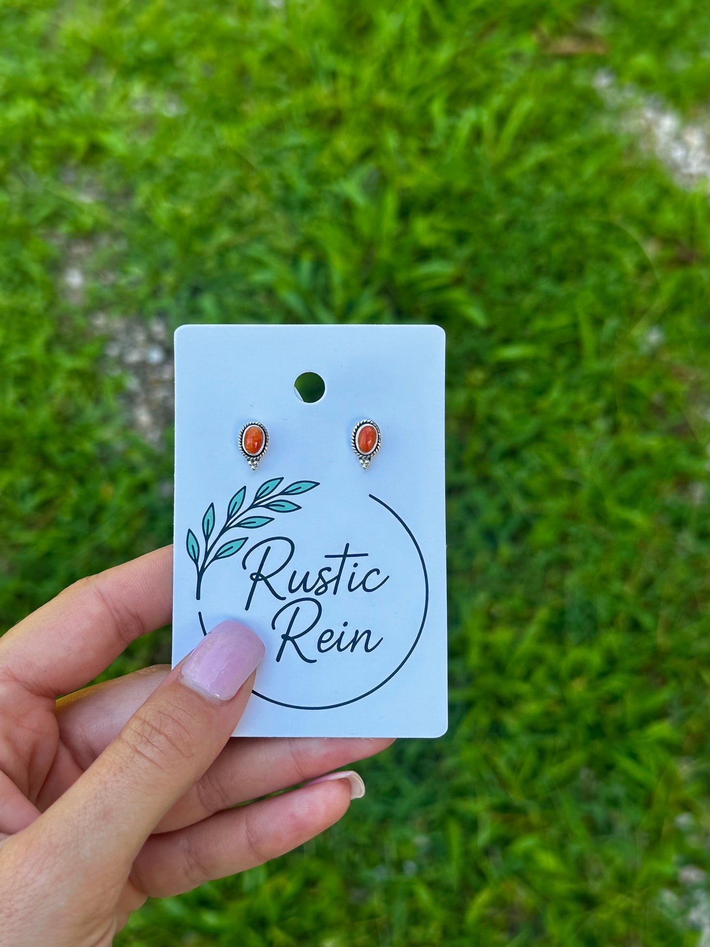 Orange spiny stud earrings