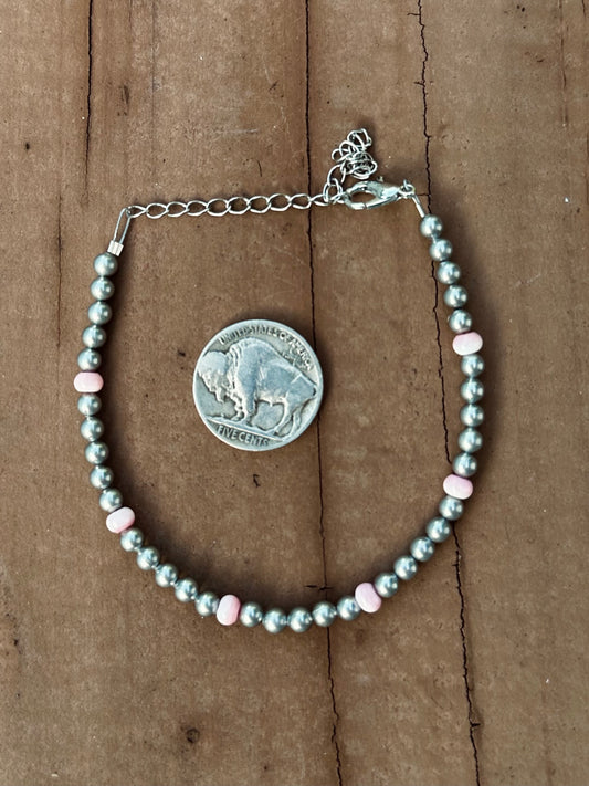 4mm silver plated & pink conch bracelet