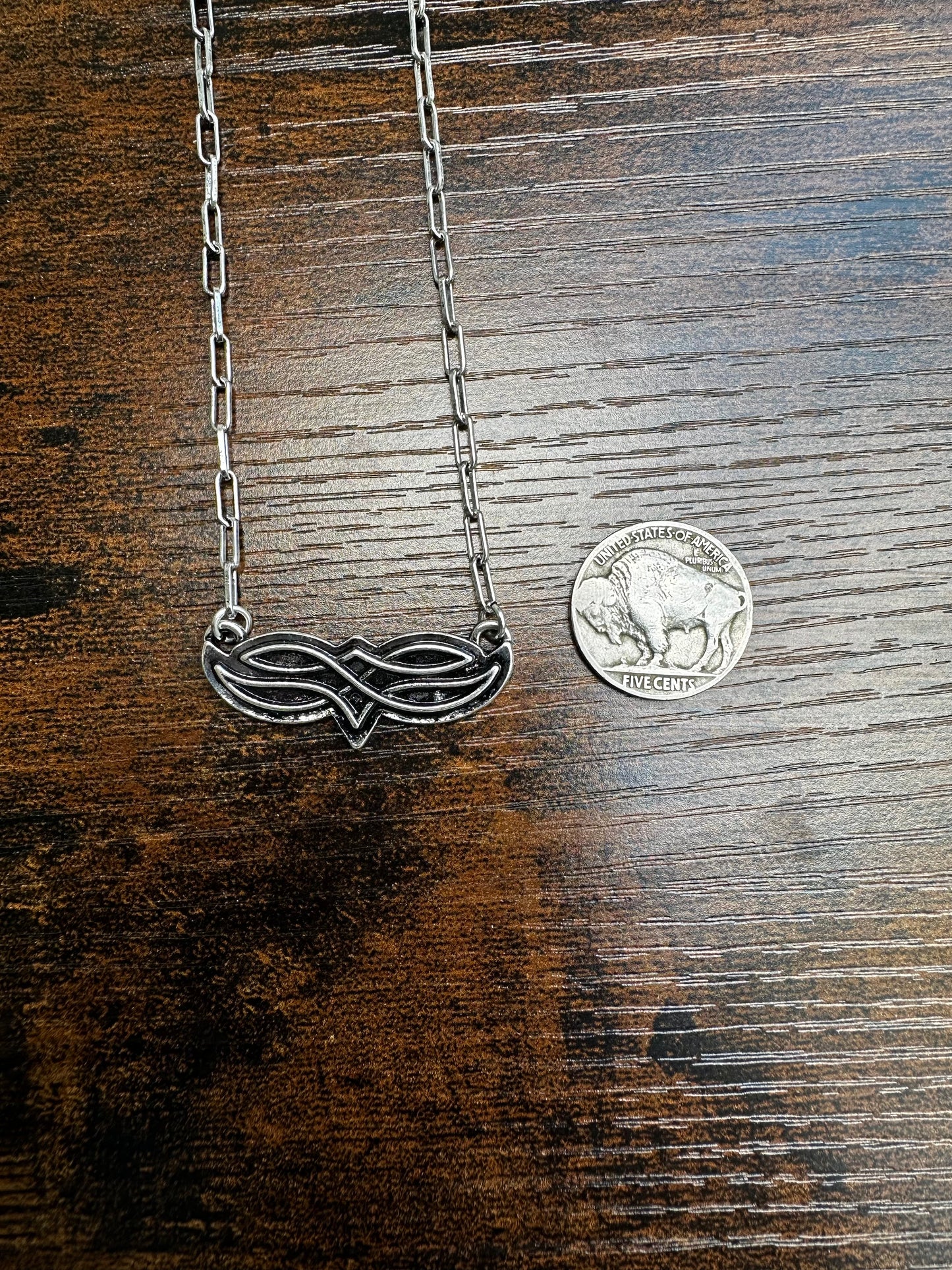 Boot stitch necklace
