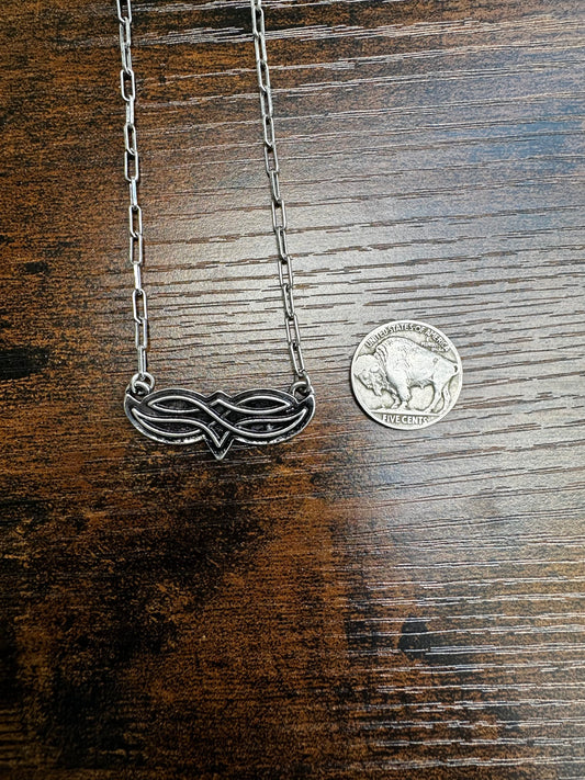 Boot stitch necklace