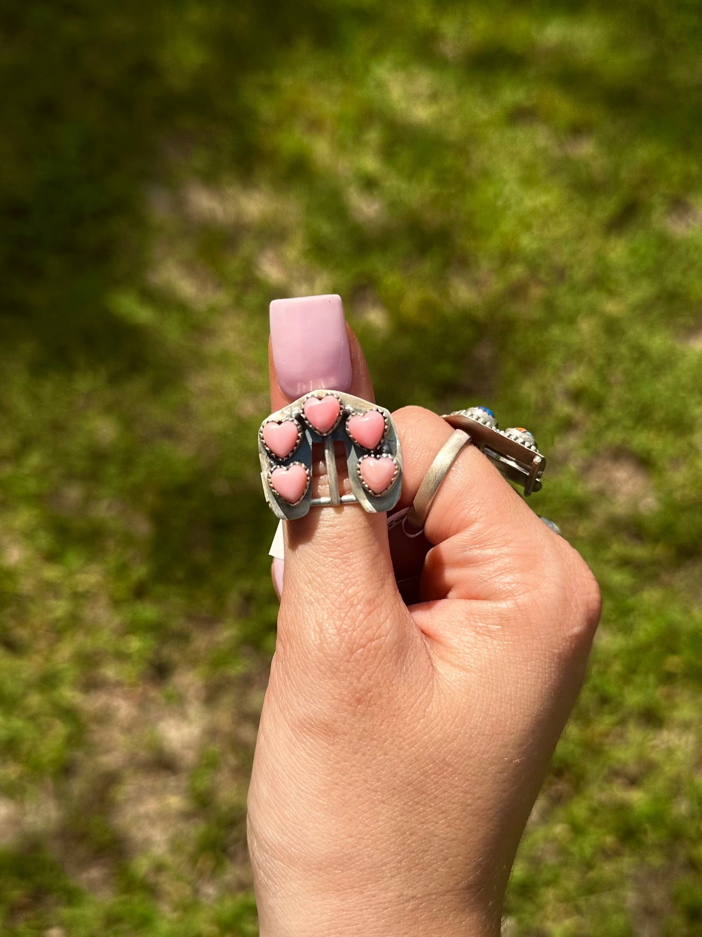 Adjustable pink conch heart buckle ring