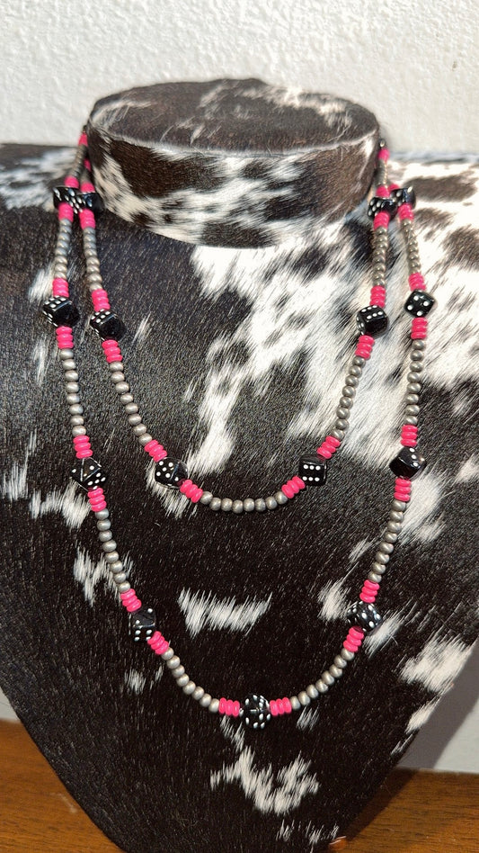 Pink dice necklace