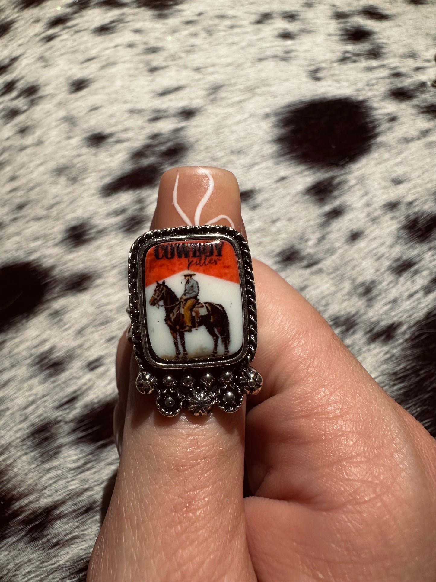 Adjustable cowboy killer ring