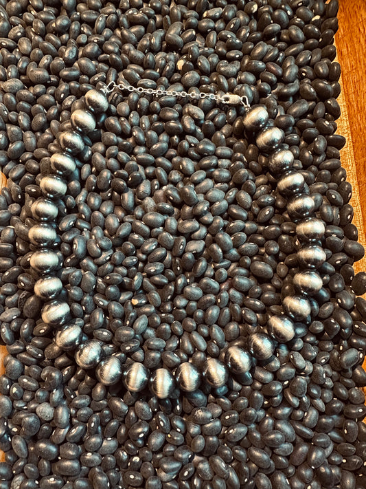 12 mm sterling silver pearls        14” with 2” extender