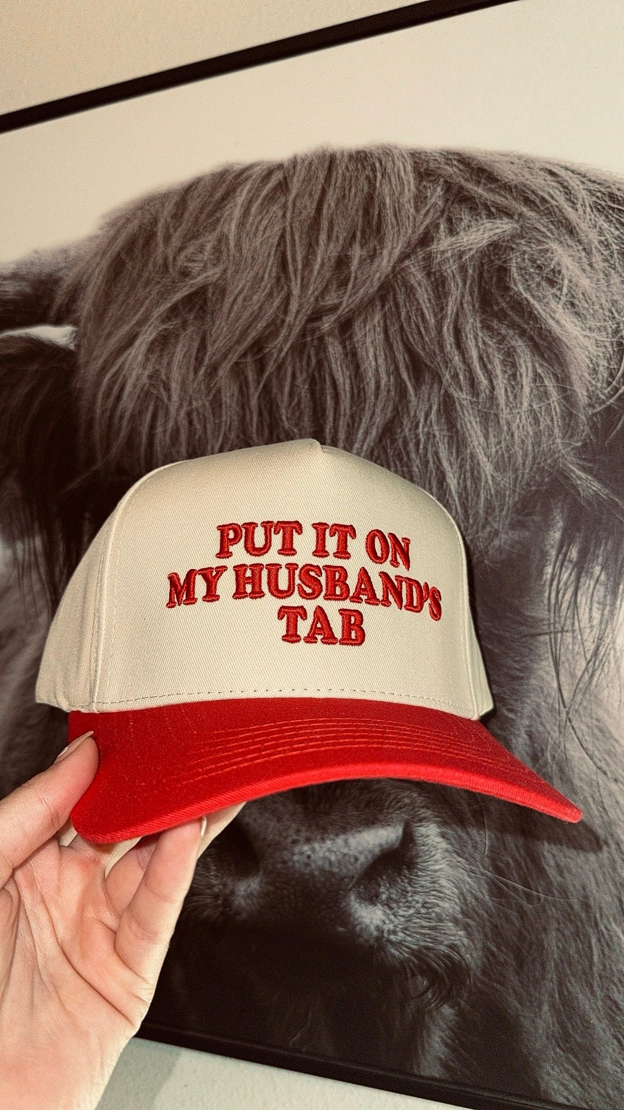 Put it on my husbands tab hat