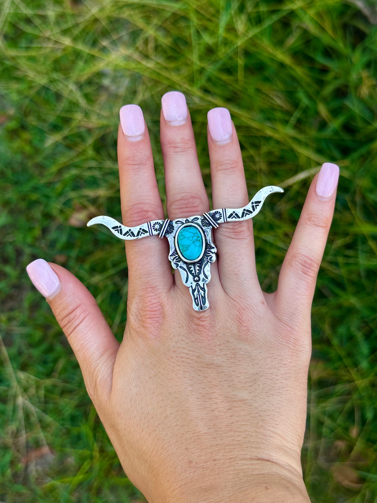 Adjustable longhorn ring
