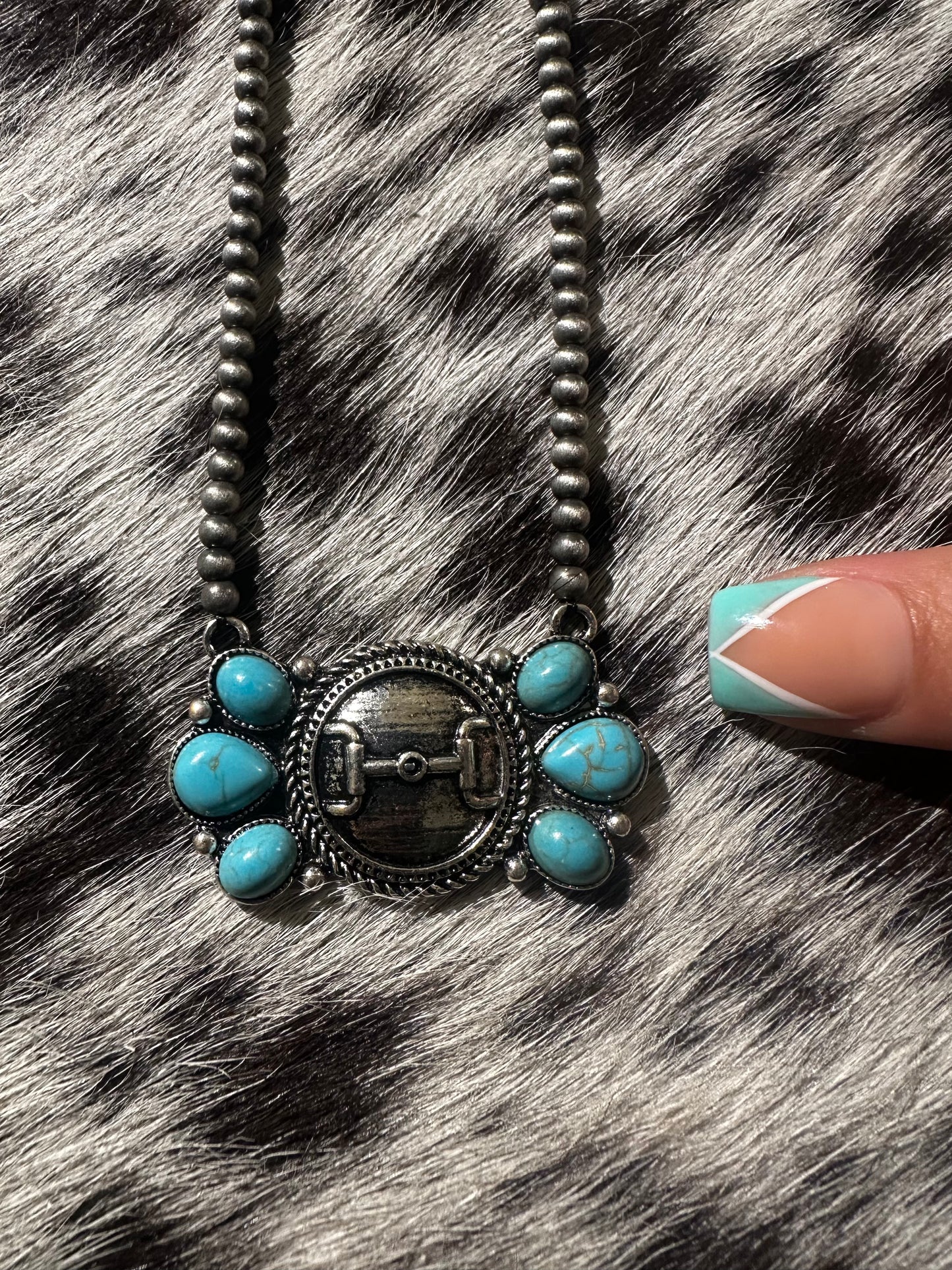 Snaffle bit necklace