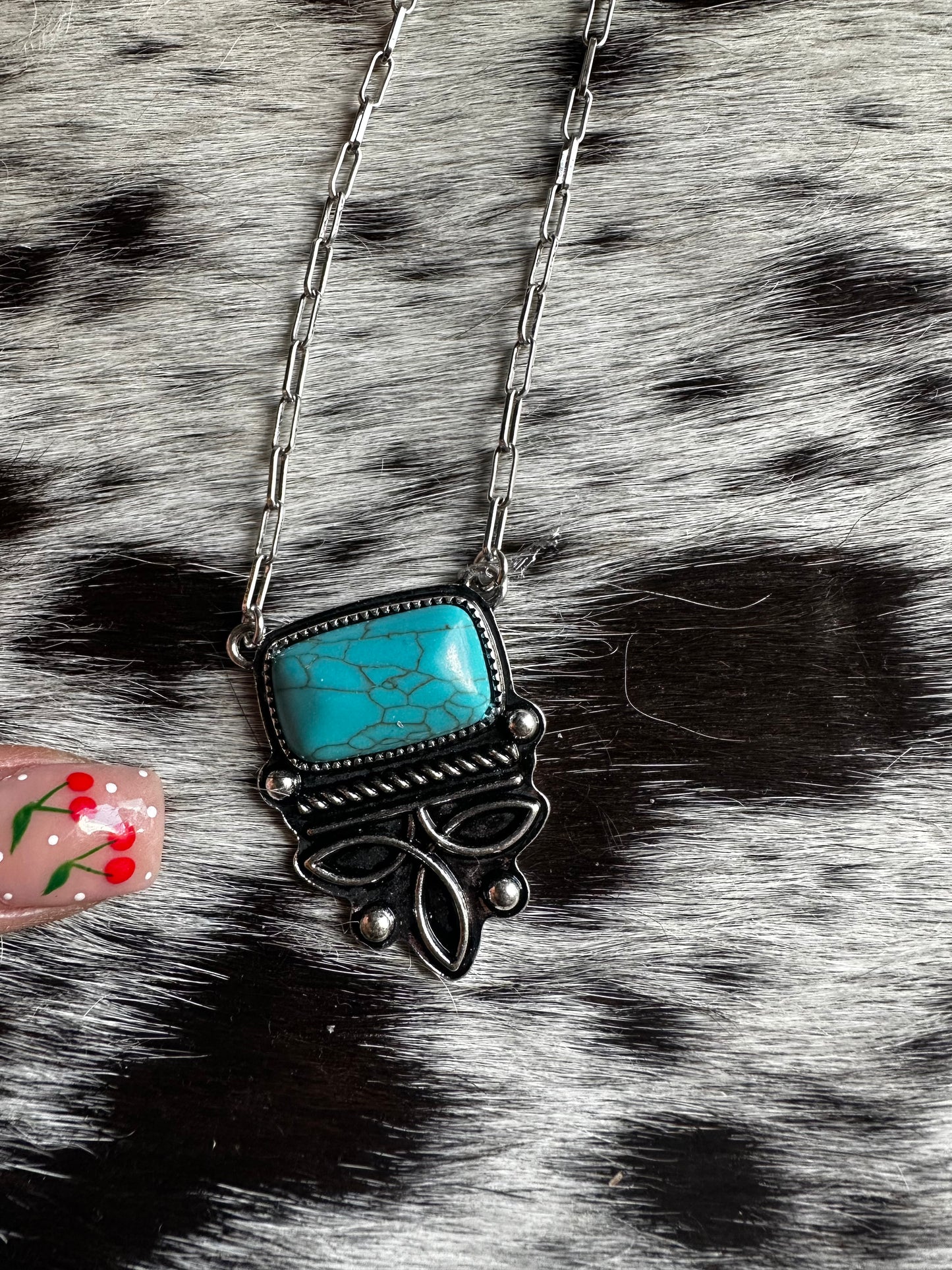 Boot stitch necklace