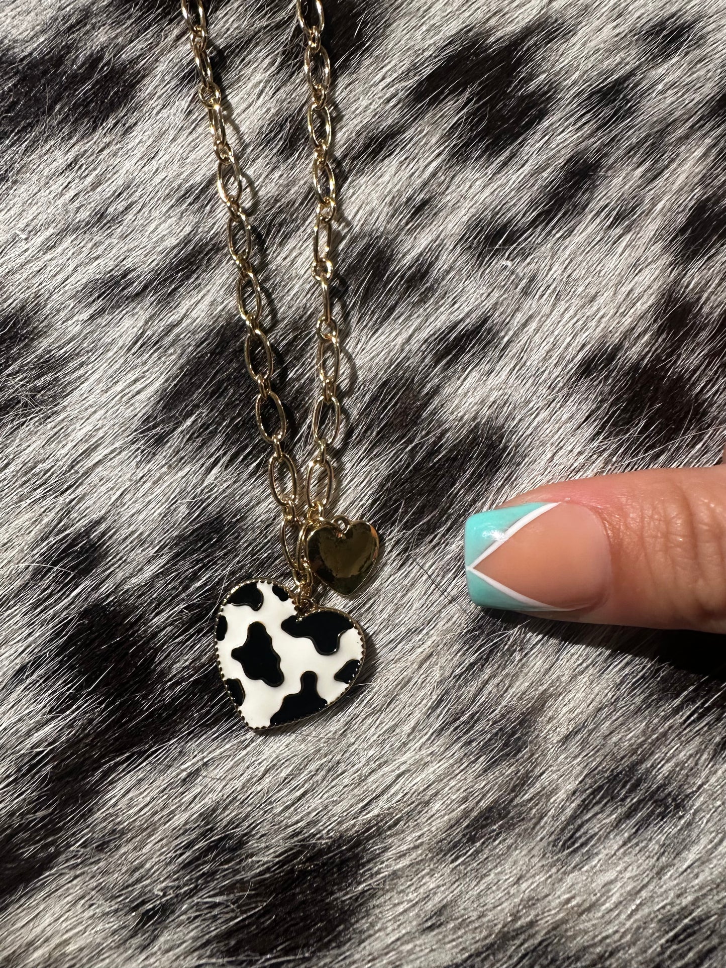 Cow print heart necklace