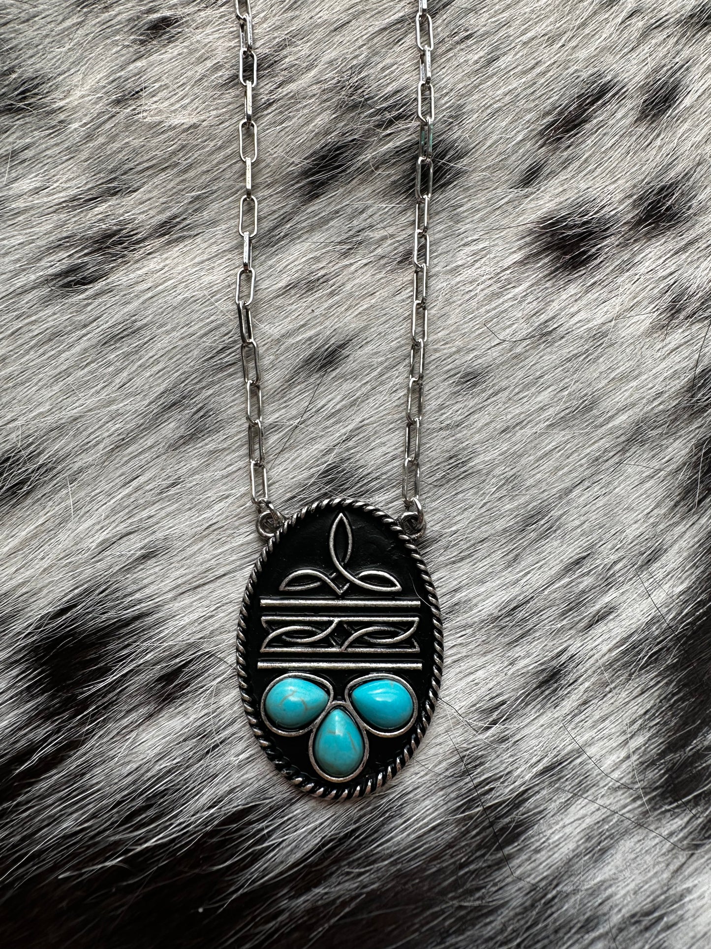 Boot stitch necklace