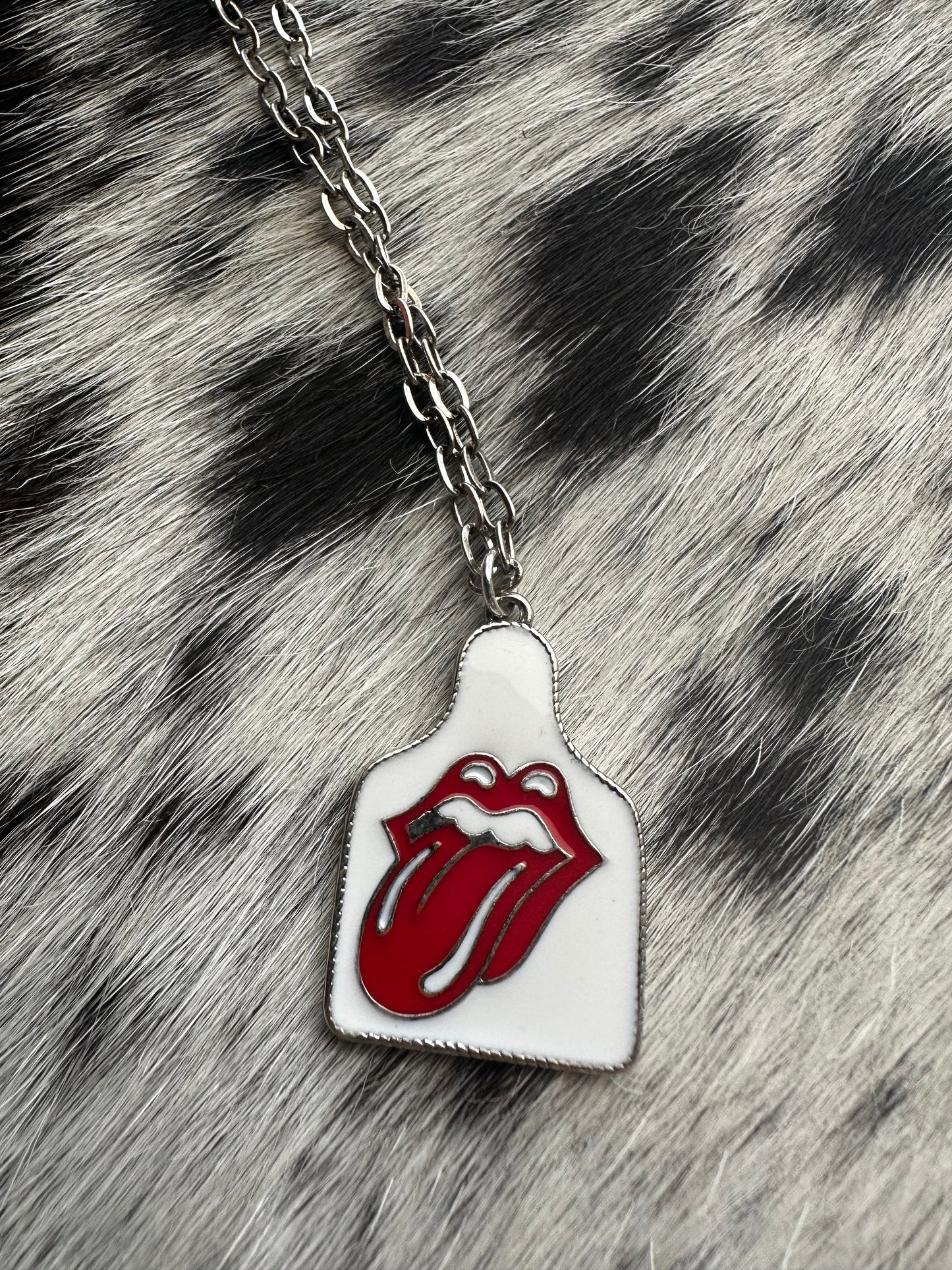 Rolling Stones cow tag necklace