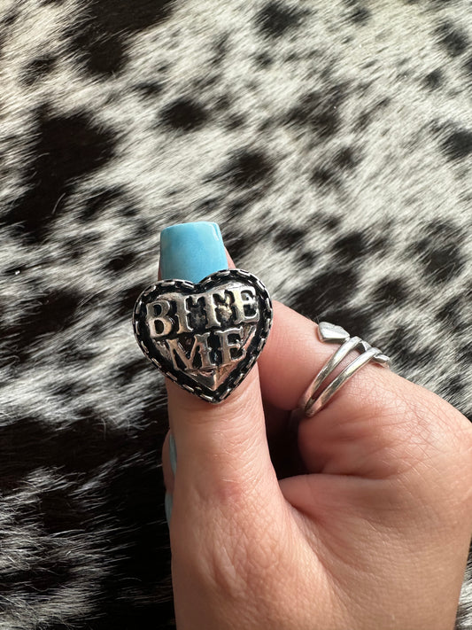 Adjustable bite me ring