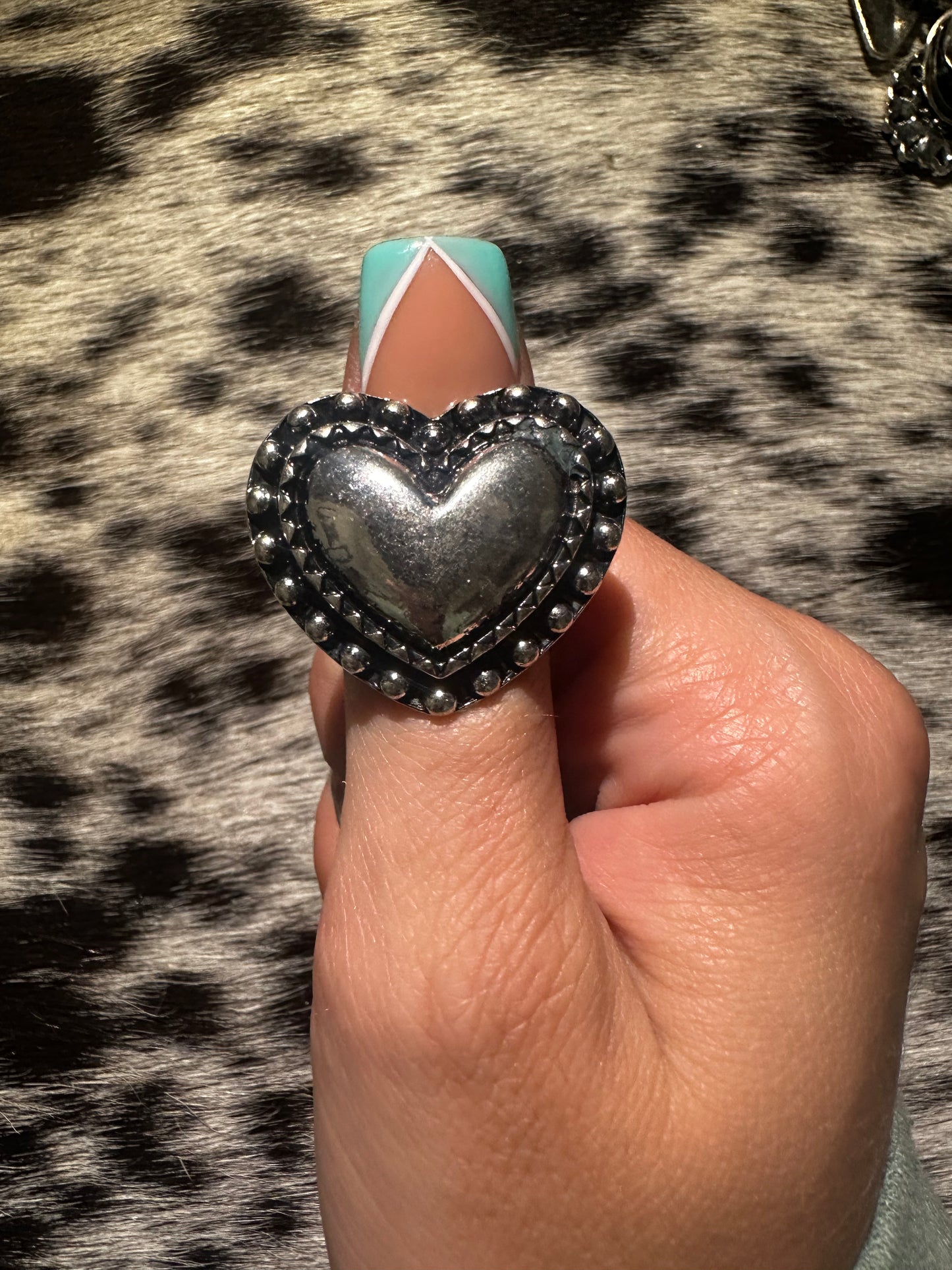 Adjustable heart ring