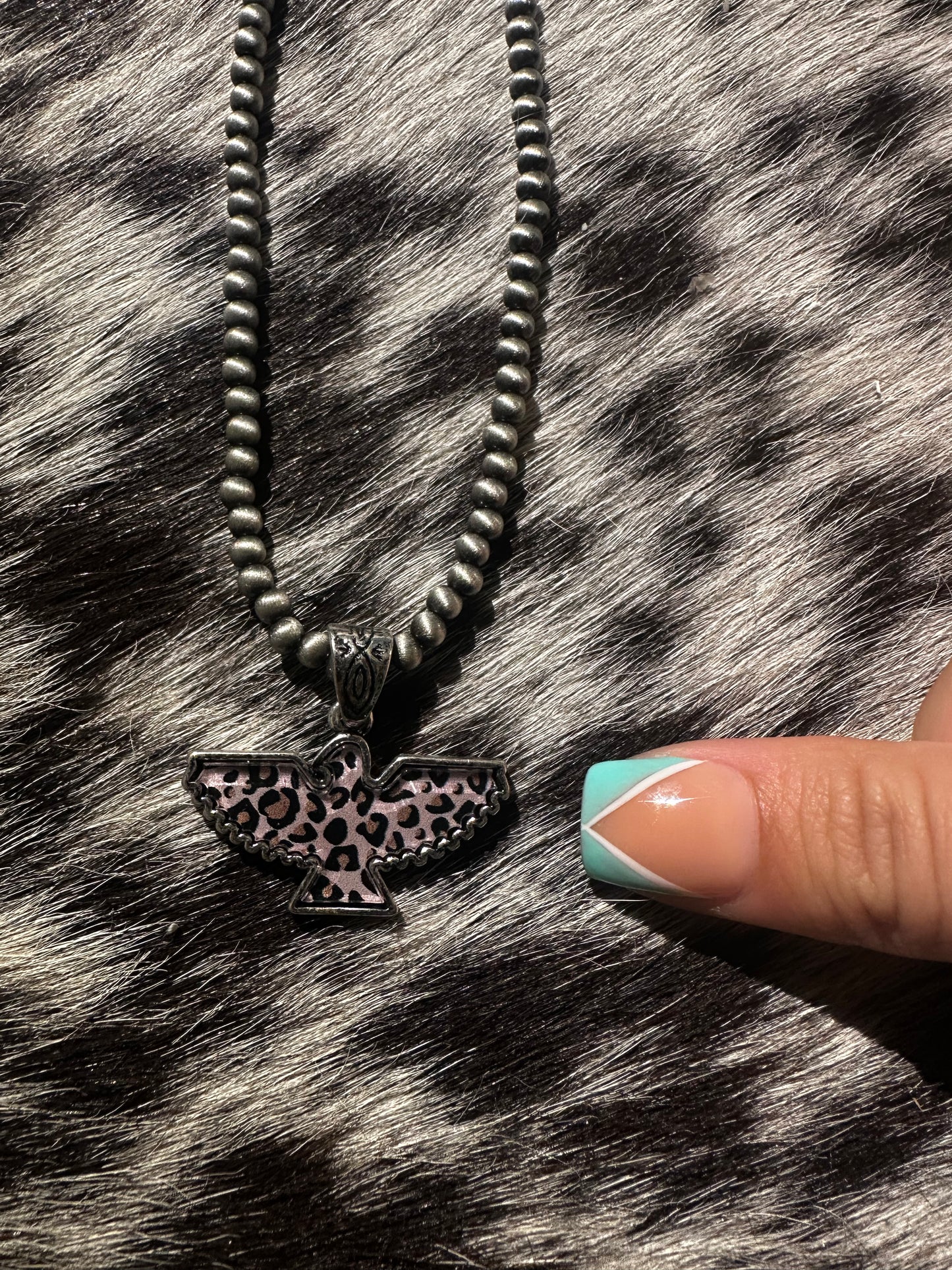 Cheetah bird necklace
