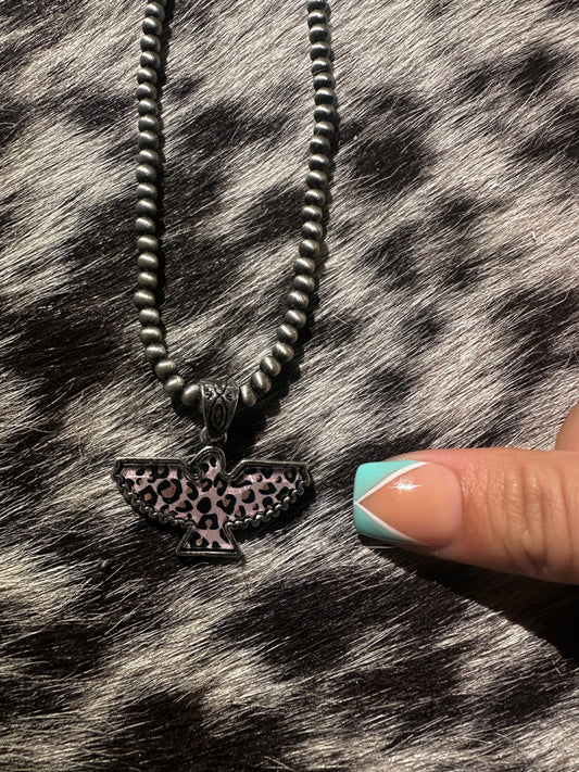 Cheetah bird necklace