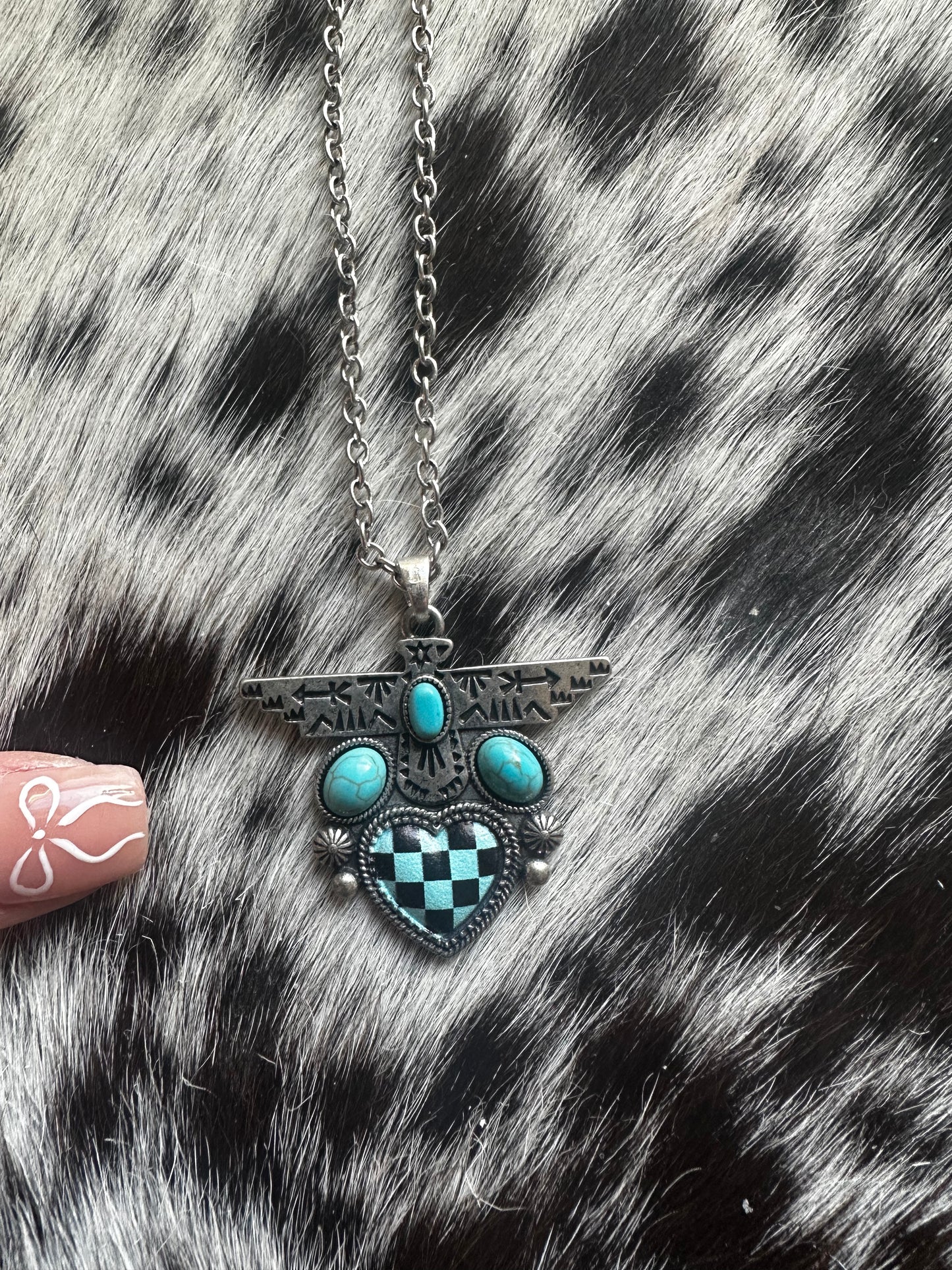 Checkered heart bird necklace