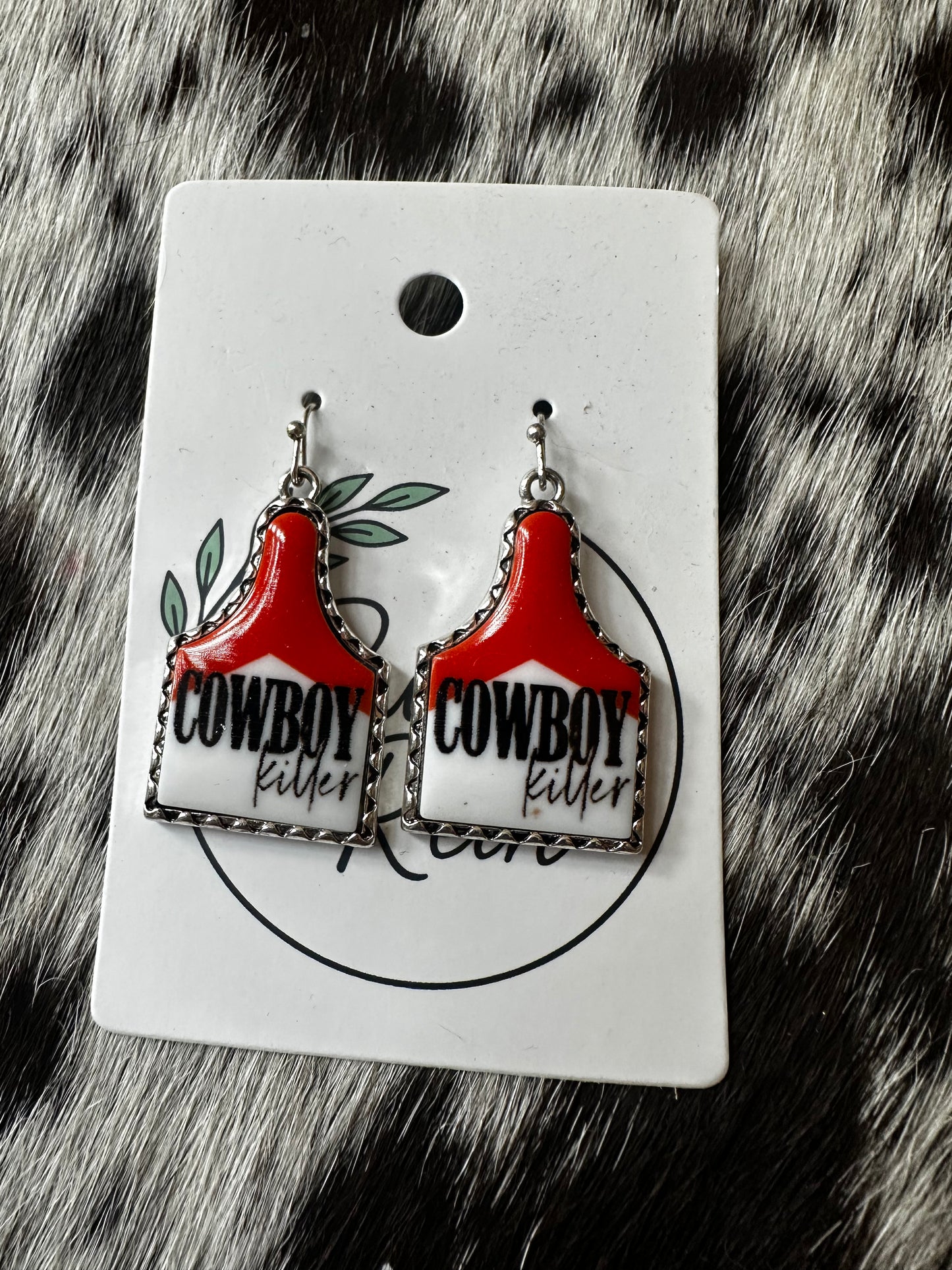 Cowboy killer ear tag earrings