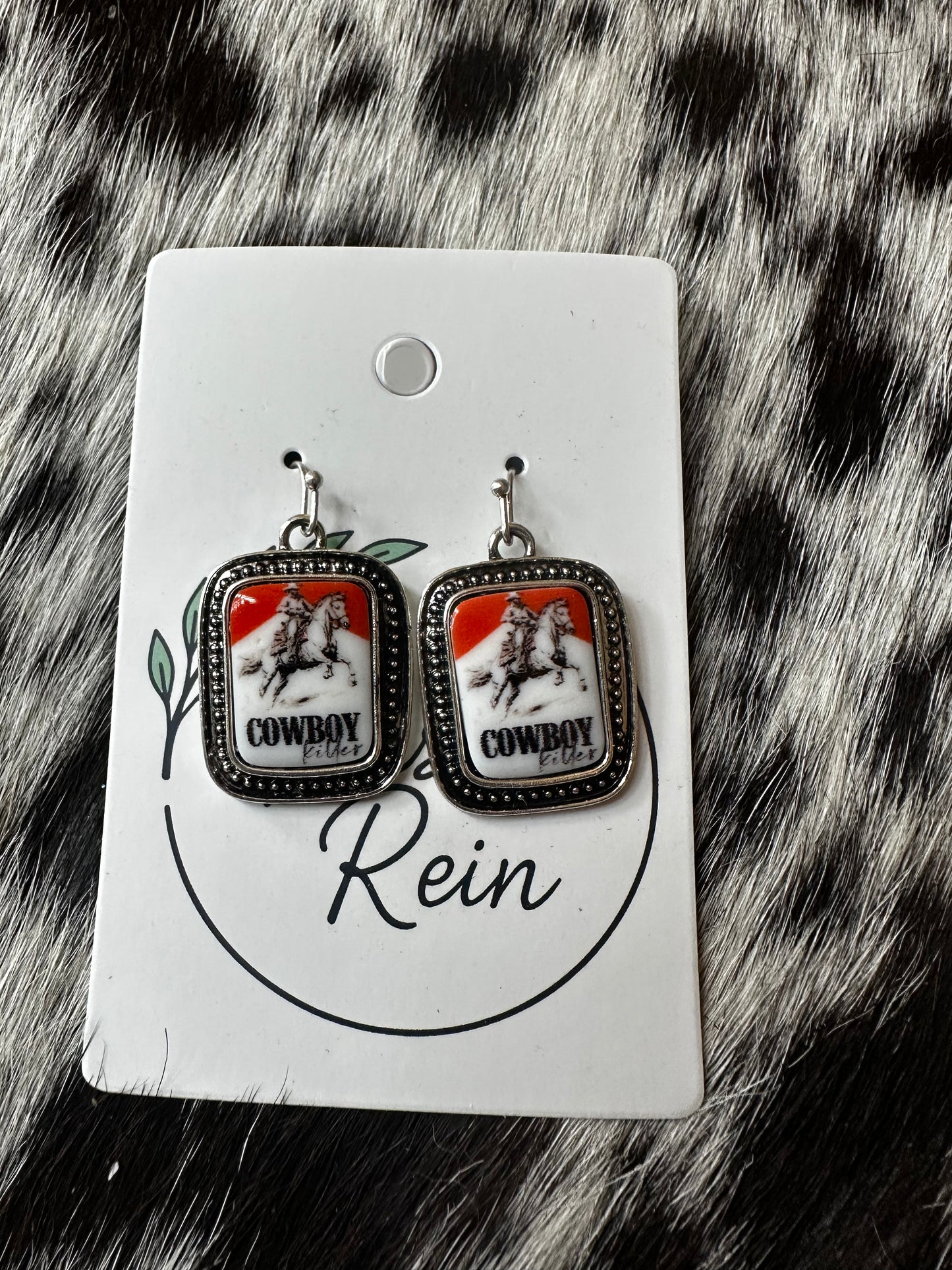 Cowboy killer earrings