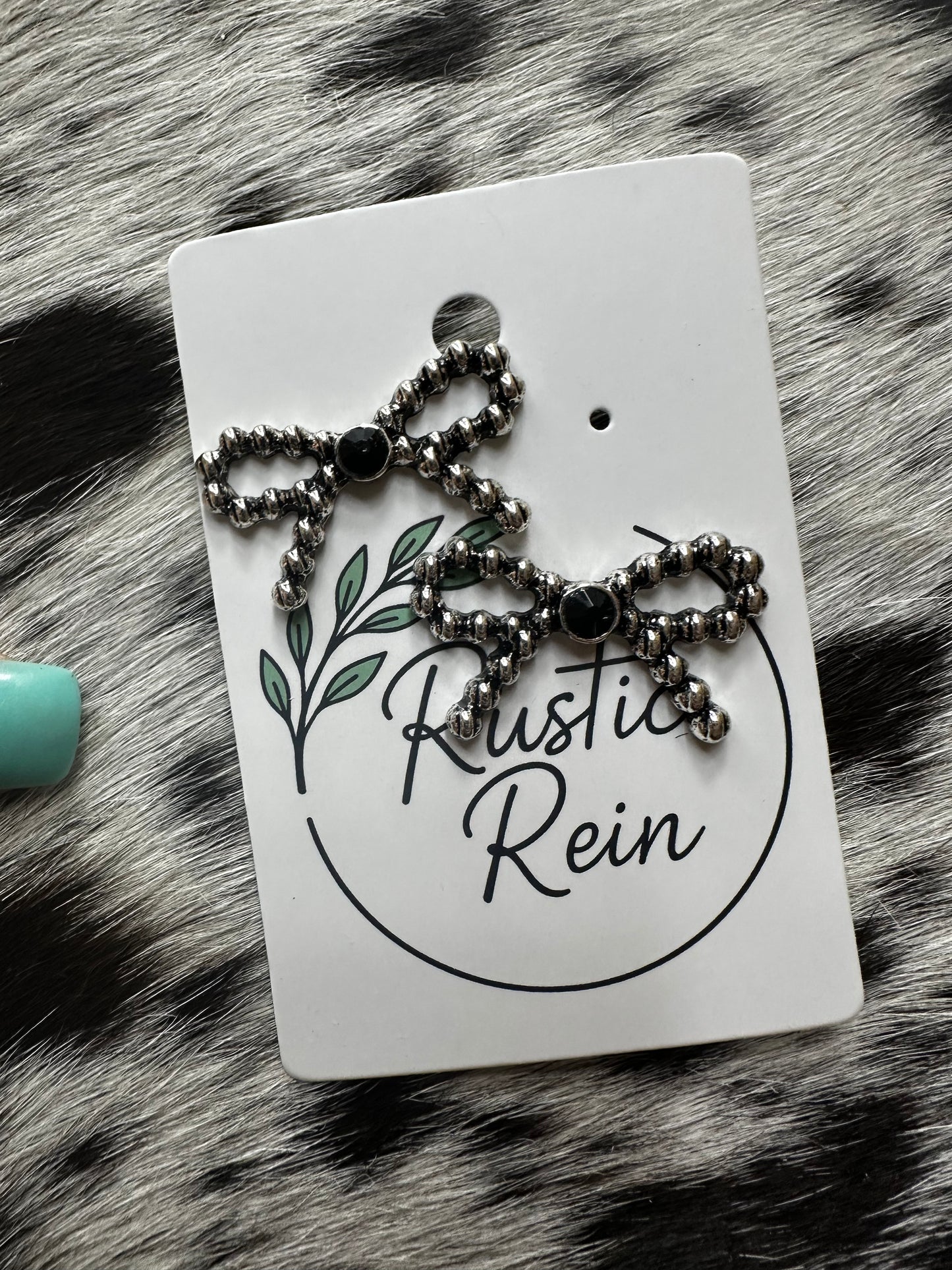Blk bow tie earrings
