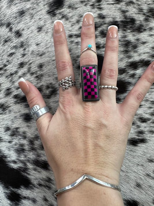Adjustable pink checkered ring