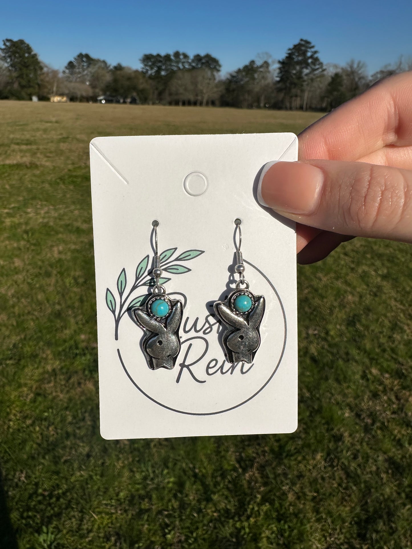 Blue playboy earrings